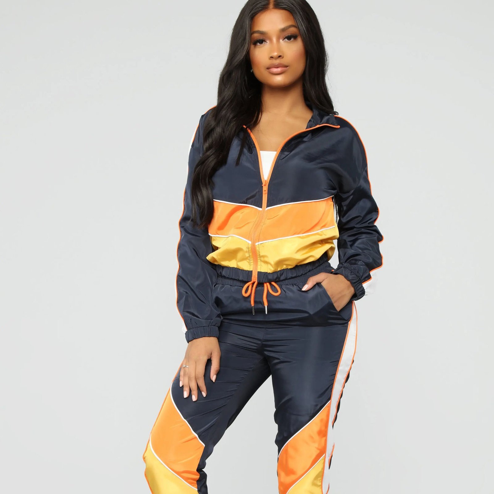 Women’s blue tracksuit with orange and yellow contrast