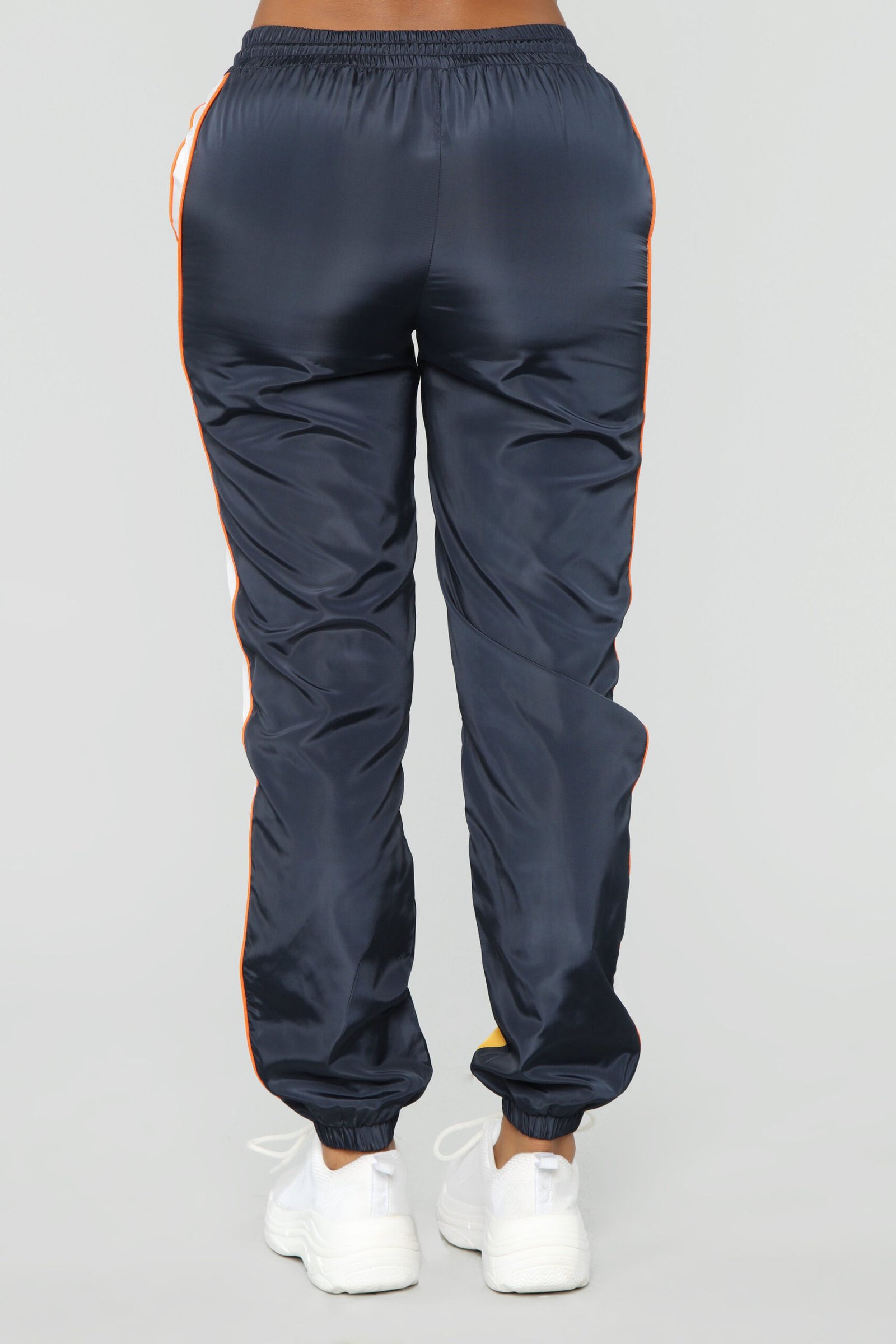 Women’s blue tracksuit with orange and yellow contrast