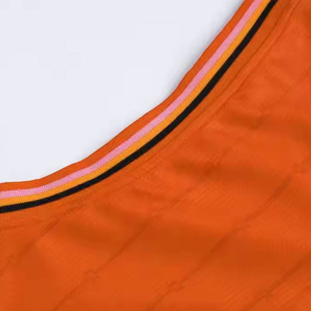 Plain blank orange basketball uniform with matching jersey and shorts
