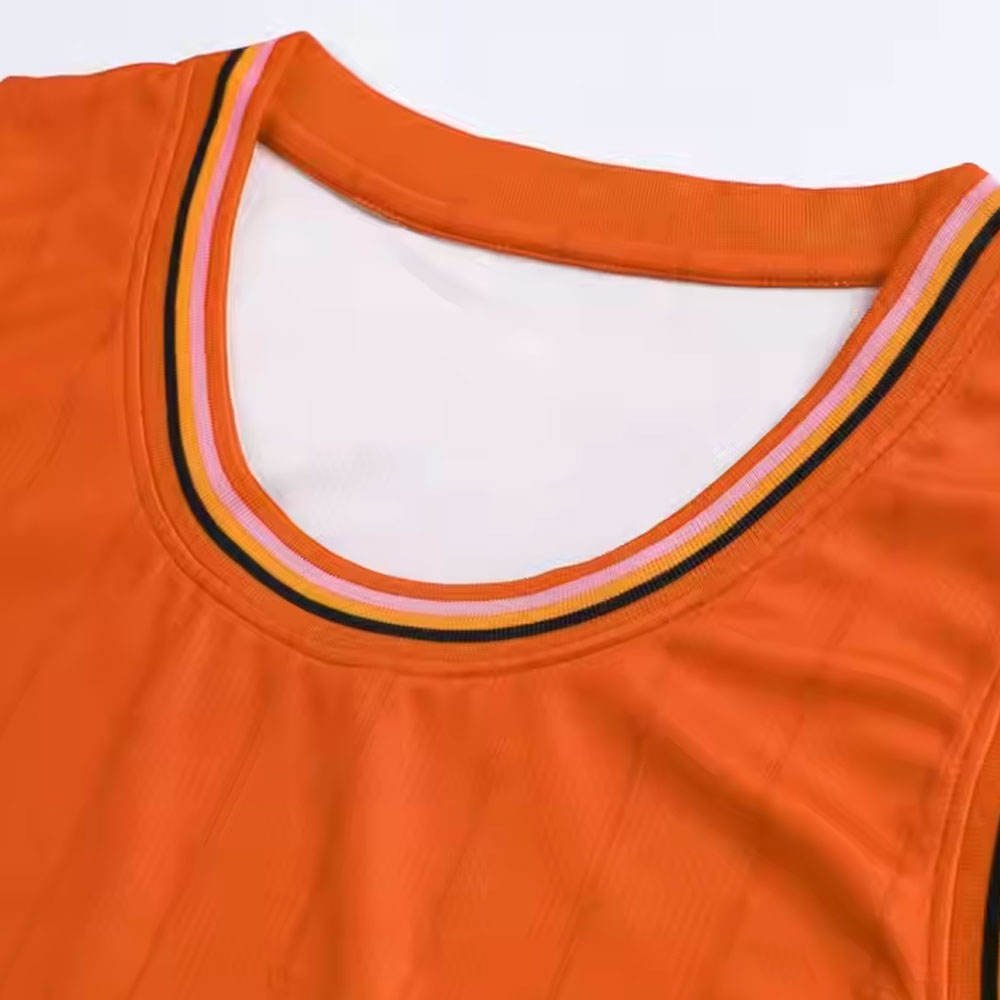 Plain blank orange basketball uniform with matching jersey and shorts