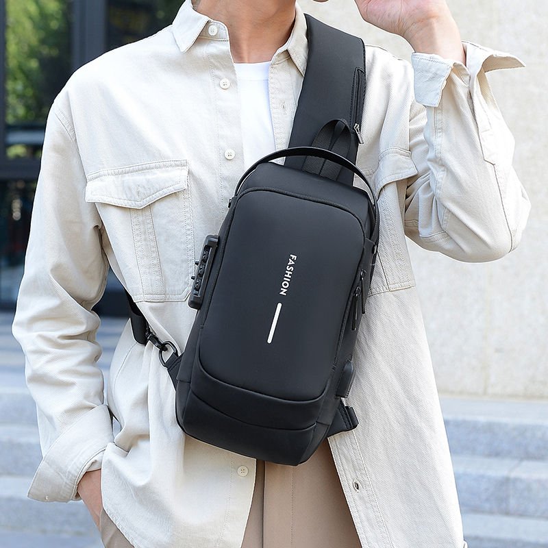 Waterproof men's sling bag with USB port